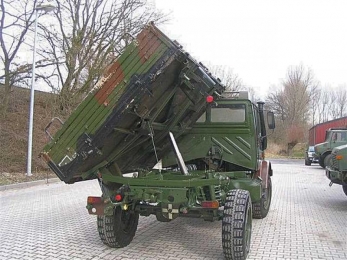 Самосвал с трехсторонней разгрузкой